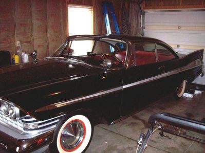The black beauty
The car's previous owner was Gino's father in law who passed away. Gino is planning on re-doing the upholstery abd otherwise the car is fine.

