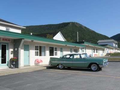Fifties motel
He used the Dodge as his main vehicle for some years, but in 1964 purchased a pickup truck and the Dodge was stored in small garage attached to his house, where it sat under a cover for 35 years. In 1997, the car was pulled out of storage and put back on the road. Some work was done to the rocker panels and one or two small patches were made in the floorpans. The green was repainted using the original shade, while the white roof remained covered with the factory paint.
