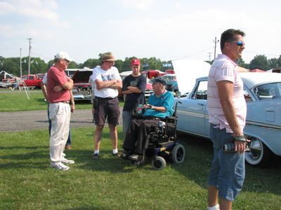 Curt at Carlisle in 2008
Curt entertaining Tom Fox, Dan Morton and Matthew Keij at the fun field in Carlisle. The guy in the front is Andre Hakker who fixed Curt's car after his fuel pump broke with Matthew's help. 
